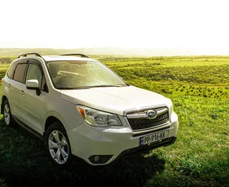 Vista frontal de um aluguel Subaru Forester em Tbilisi, Geórgia ✓ Carro #10142. ✓ Transmissão Automático TM ✓ 0 avaliações.