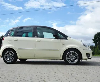 Front view of a rental Lancia Musa at Tirana airport, Albania ✓ Car #10001. ✓ Automatic TM ✓ 0 reviews.