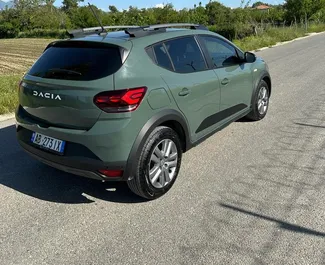 Dacia Sandero Stepway 2024 car hire in Albania, featuring ✓ Petrol fuel and 90 horsepower ➤ Starting from 27 EUR per day.