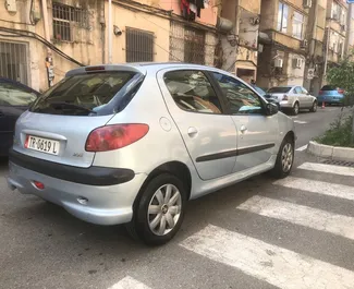 Peugeot 206 2005 automašīnas noma Albānijā, iezīmes ✓ Benzīns degviela un 60 zirgspēki ➤ Sākot no 20 EUR dienā.