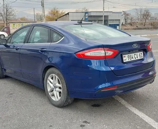 Ford Fusion Sedanのレンタル。アルメニアにてでの快適さ, プレミアムカーレンタル ✓ 預金250 USD ✓ TPL, CDW, 海外, ヤングの保険オプション付き。