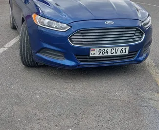 Front view of a rental Ford Fusion Sedan in Yerevan, Armenia ✓ Car #9942. ✓ Automatic TM ✓ 0 reviews.