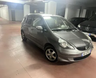 Araç Kiralama Honda Jazz #10048 Otomatik Tiran havaalanında, 1,4L motor ile donatılmış ➤ Armand tarafından Arnavutluk'ta.