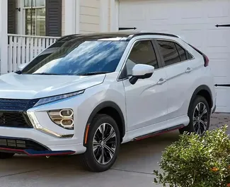 Front view of a rental Mitsubishi Eclipse Cross in Dubai, UAE ✓ Car #10020. ✓ Automatic TM ✓ 0 reviews.