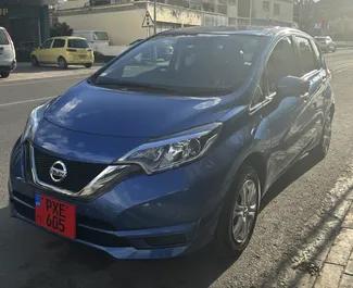واجهة أمامية لسيارة إيجار Nissan Note في في ليماسول, قبرص ✓ رقم السيارة 9614. ✓ ناقل حركة أوتوماتيكي ✓ تقييمات 0.
