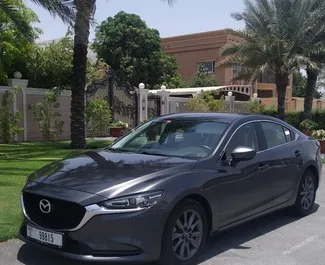 Vista frontal de un Mazda 6 de alquiler en Dubai, EAU ✓ Coche n.º 10029. ✓ Automático TM ✓ 0 opiniones.