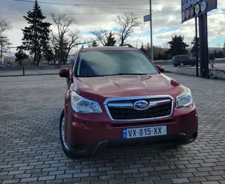 Predný pohľad na prenajaté auto Subaru Forester v v Tbilisi, Georgia ✓ Auto č. 10140. ✓ Prevodovka Automatické TM ✓ Hodnotenia 0.