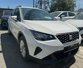 Front view of a rental SEAT Arona in Tirana, Albania ✓ Car #10134. ✓ Automatic TM ✓ 0 reviews.