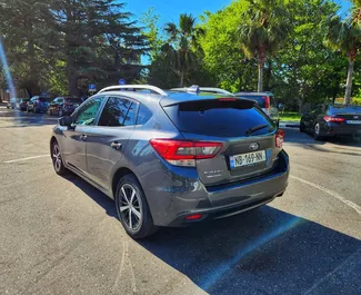 Intérieur de Subaru Impreza à louer en Géorgie. Une excellente voiture de 5 places avec une transmission Automatique.