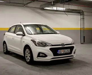 Front view of a rental Hyundai i20 in Budva, Montenegro ✓ Car #10381. ✓ Automatic TM ✓ 0 reviews.