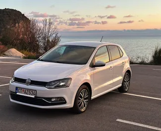 Front view of a rental Volkswagen Polo in Rafailovici, Montenegro ✓ Car #1032. ✓ Manual TM ✓ 2 reviews.