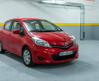 Front view of a rental Toyota Yaris in Budva, Montenegro ✓ Car #10376. ✓ Automatic TM ✓ 0 reviews.