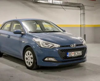 Front view of a rental Hyundai i20 in Budva, Montenegro ✓ Car #10389. ✓ Automatic TM ✓ 0 reviews.