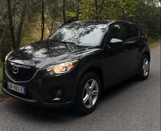 Frontvisning av en leiebil Mazda CX-5 i Tirana, Albania ✓ Bil #10421. ✓ Automatisk TM ✓ 0 anmeldelser.