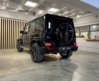 Mercedes-Benz G63 AMG 2022 car hire in Spain, featuring ✓ Petrol fuel and 585 horsepower ➤ Starting from 500 EUR per day.