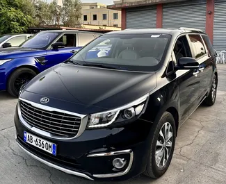 Front view of a rental Kia Carnival at Tirana airport, Albania ✓ Car #10448. ✓ Automatic TM ✓ 0 reviews.