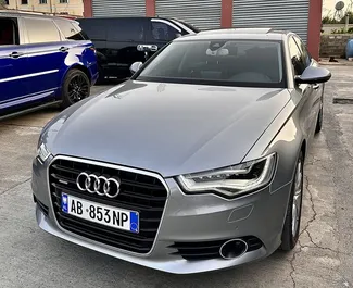 Vista frontal de un Audi A6 de alquiler en el aeropuerto de Tirana, Albania ✓ Coche n.º 10446. ✓ Automático TM ✓ 1 opiniones.