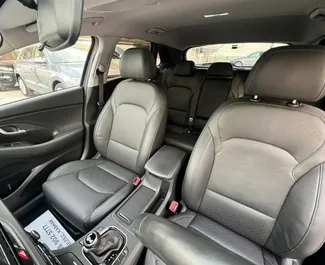 Interior of Hyundai i30 for hire in Albania. A Great 5-seater car with a Automatic transmission.