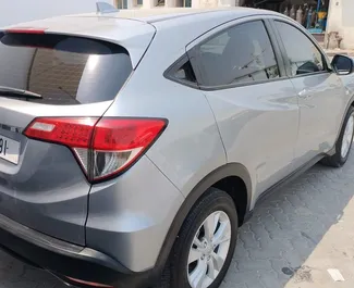 Honda HR-V 2021 car hire in the UAE, featuring ✓ Petrol fuel and 150 horsepower ➤ Starting from 120 AED per day.