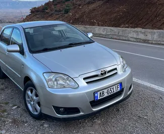 Sprednji pogled najetega avtomobila Toyota Corolla v v Tirani, Albanija ✓ Avtomobil #10416. ✓ Menjalnik Samodejno TM ✓ Mnenja 0.