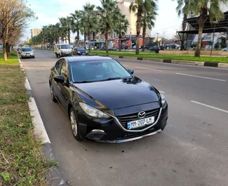 Front view of a rental Mazda 3 in Kutaisi, Georgia ✓ Car #8009. ✓ Automatic TM ✓ 0 reviews.