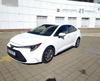 Priekinė automobilio, kurį nuomojate Toyota Corolla Sedan Batumyje, Gruzija vaizdas ✓ Automobilis #10563. ✓ Pavarų dėžė Automatinis TM ✓ Atsiliepimai 0.