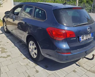 Front view of a rental Opel Astra Sports Tourer in Durres, Albania ✓ Car #10579. ✓ Manual TM ✓ 0 reviews.