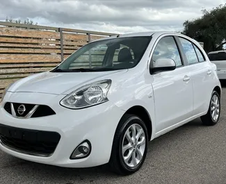 Frontvisning av en leiebil Nissan Micra i Mytilene, Hellas ✓ Bil #10554. ✓ Manuell TM ✓ 0 anmeldelser.