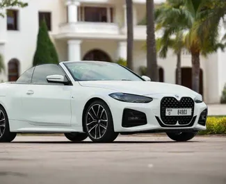 BMW 420i Cabrio 2023 car hire in the UAE, featuring ✓ Petrol fuel and 350 horsepower ➤ Starting from 450 AED per day.