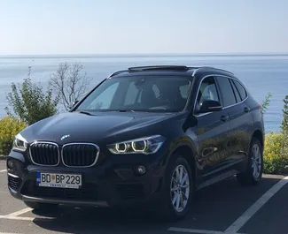 Front view of a rental BMW X1 in Rafailovici, Montenegro ✓ Car #7115. ✓ Automatic TM ✓ 1 reviews.
