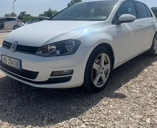 Front view of a rental Volkswagen Golf 7 at Tirana airport, Albania ✓ Car #10517. ✓ Manual TM ✓ 0 reviews.