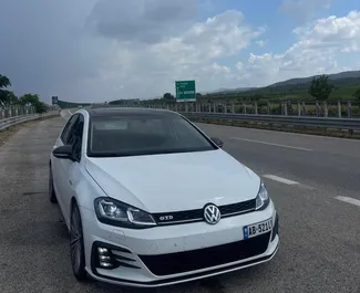 Front view of a rental Volkswagen Golf 7 at Tirana airport, Albania ✓ Car #10516. ✓ Automatic TM ✓ 0 reviews.