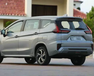 Mitsubishi Xpander 2023 car hire in the UAE, featuring ✓ Petrol fuel and 180 horsepower ➤ Starting from 150 AED per day.