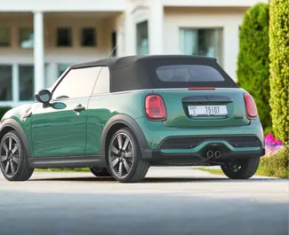 Mini Cooper S Cabrio 2024 car hire in the UAE, featuring ✓ Petrol fuel and 220 horsepower ➤ Starting from 350 AED per day.