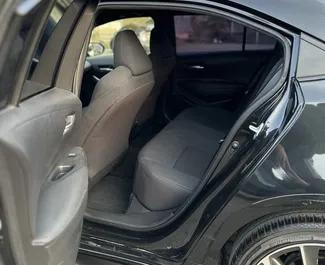 Interior of Toyota Corolla Sedan for hire in Georgia. A Great 5-seater car with a Automatic transmission.