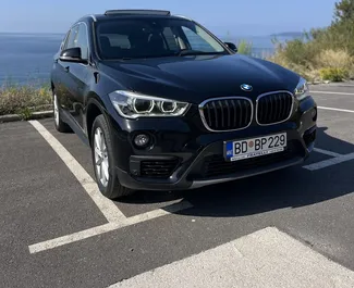 BMW X1 2019 car hire in Montenegro, featuring ✓ Diesel fuel and 150 horsepower ➤ Starting from 50 EUR per day.