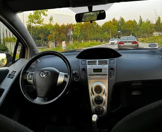 Interior of Toyota Yaris for hire in Albania. A Great 5-seater car with a Manual transmission.