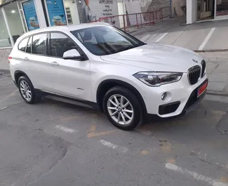 Frontvisning av en leiebil BMW X1 i Limassol, Kypros ✓ Bil #10642. ✓ Automatisk TM ✓ 0 anmeldelser.