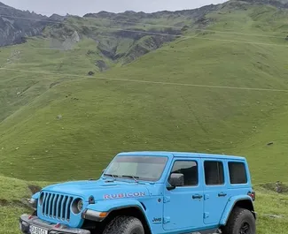 Jeep Wrangler Rubicon 2021 car hire in Georgia, featuring ✓ Petrol fuel and 275 horsepower ➤ Starting from 265 GEL per day.