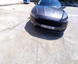 Прокат машини Ford Fusion Sedan #10702 (Автомат) в аеропорту Кутаїсі, з двигуном 2,5л. Бензин ➤ Безпосередньо від Ніка в Грузії.