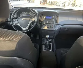 Interior of Hyundai i30 for hire in Albania. A Great 5-seater car with a Manual transmission.