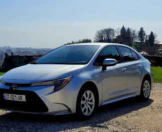 Front view of a rental Toyota Corolla Sedan in Kutaisi, Georgia ✓ Car #8565. ✓ Automatic TM ✓ 0 reviews.