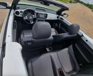 Volkswagen Beetle Cabrio 2018 car hire in Georgia, featuring ✓ Petrol fuel and 174 horsepower ➤ Starting from 202 GEL per day.