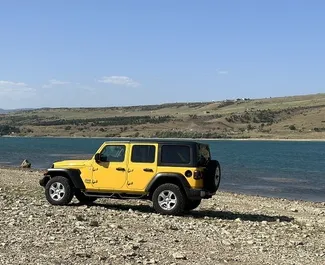 Jeep Wrangler location. Confort, SUV Voiture à louer en Géorgie ✓ Dépôt de 800 GEL ✓ RC, CDW, ATR, Passagers, Vol options d'assurance.