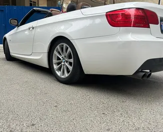 Vista frontal de um aluguel BMW 3-series Cabrio em Tbilisi, Geórgia ✓ Carro #10825. ✓ Transmissão Automático TM ✓ 1 avaliações.