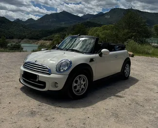 Front view of a rental Mini Cooper Cabrio in Barcelona, Spain ✓ Car #10833. ✓ Automatic TM ✓ 0 reviews.