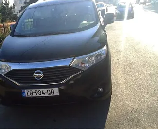 Sprednji pogled najetega avtomobila Nissan Quest v v Tbilisiju, Georgia ✓ Avtomobil #10899. ✓ Menjalnik Samodejno TM ✓ Mnenja 0.