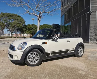 Mini Cooper Cabrio 2013 automobilio nuoma Ispanijoje, savybės ✓ Benzinas degalai ir 98 arklio galios ➤ Nuo 50 EUR per dieną.