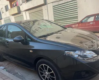 Front view of a rental SEAT Ibiza at Tirana airport, Albania ✓ Car #10909. ✓ Manual TM ✓ 0 reviews.