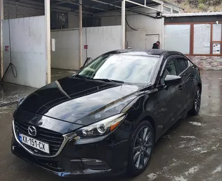 Kiralık bir Mazda 3 Tiflis'te, Gürcistan ön görünümü ✓ Araç #11062. ✓ Otomatik TM ✓ 0 yorumlar.